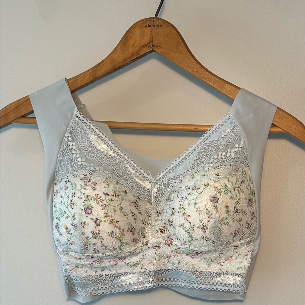 Lacy bralet. Unworn without tags. Laser cut edges.